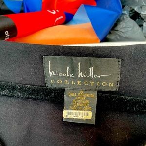 Flowy Nicole Miller dress. Sleeves bell a tad